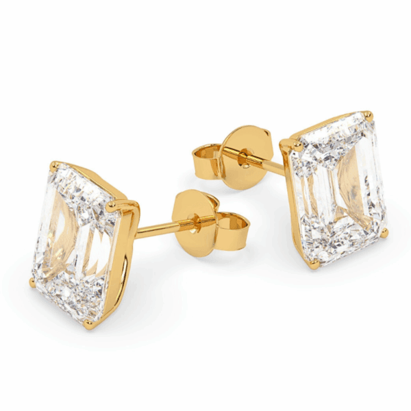 geltono aukso auskarai su stačiakampio formos emerald cut deimantu