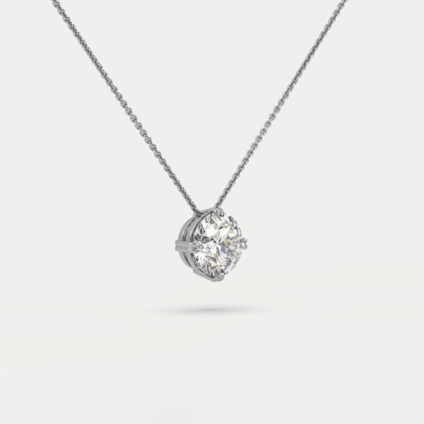 balto aukso arba platinos pakabukas su apvaliu deimantu (round cut)