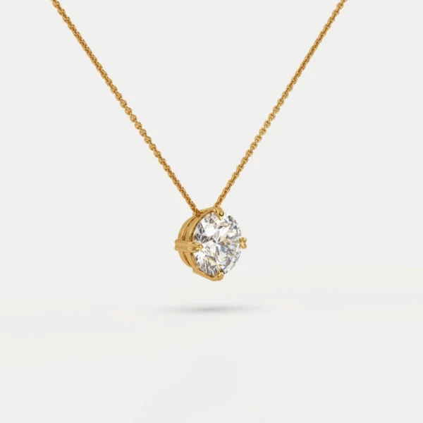 geltono aukso pakabukas su apvaliu round cut deimantu