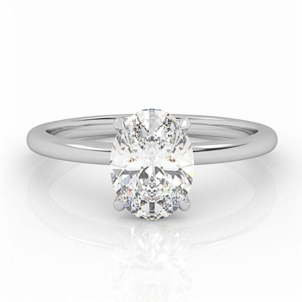 klasikinis balto aukso arba platinos sužadėtuvių žiedas su ovalo formos deimantu