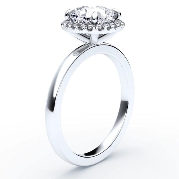 Klasikinis sužadėtuvių žiedas su deimantu ir halo juostele iš balto aukso arba platinos - cushion cut