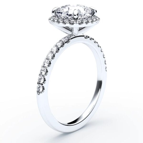 Modernus sužadėtuvių žiedas su deimantais ir halo juostele iš balto aukso arba platinos - cushion cut