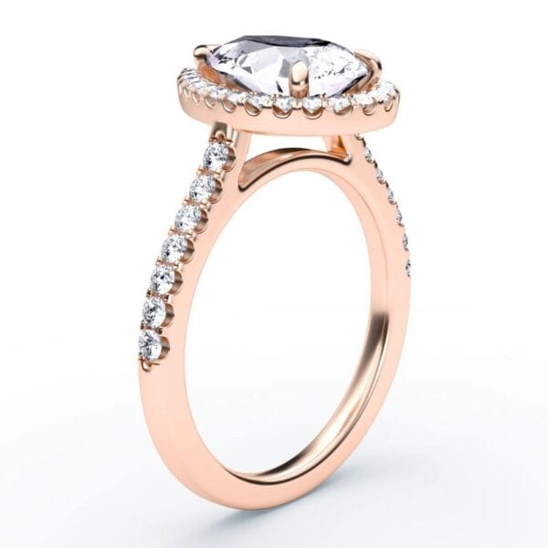 Modernus sužadėtuvių žiedas su deimantais ir halo juostele iš raudono aukso - pear cut