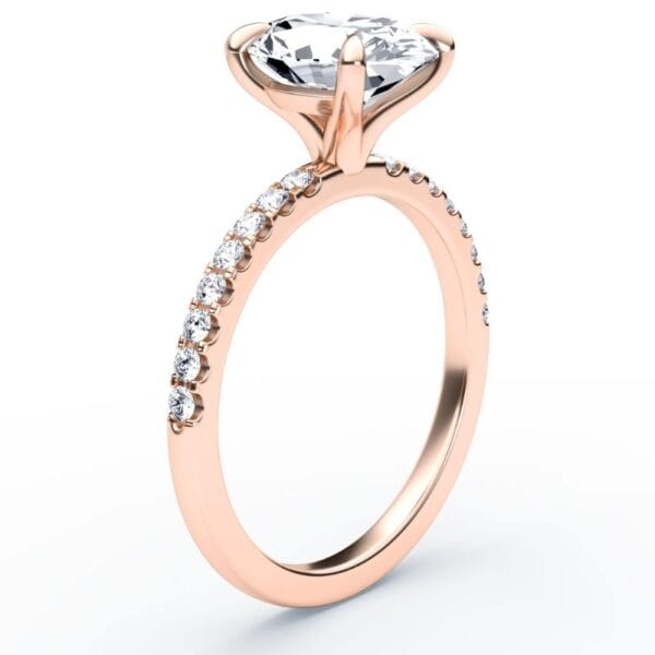 Modernus sužadėtuvių žiedas su deimantu iš raudono aukso - oval cut