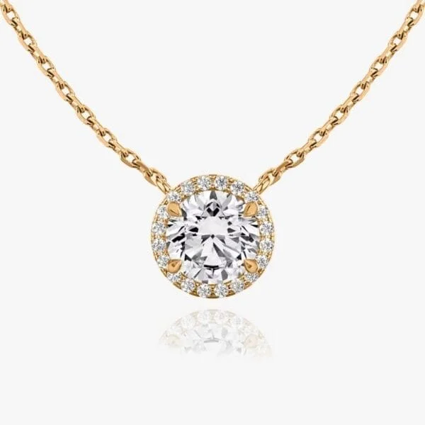 Pakabukas su apvalios formos deimantu ir Halo juostele iš raudono aukso