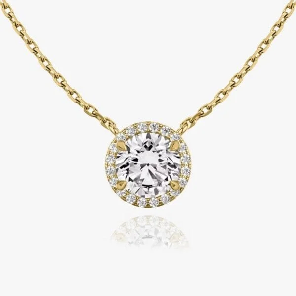 Pakabukas su apvalios formos deimantu ir Halo juostele iš geltono aukso