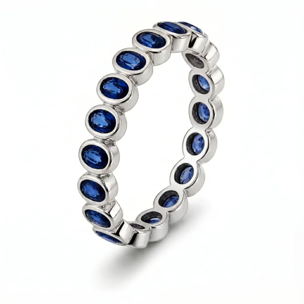 4.23 ct žiedas su mėlynais safyrais balto aukso