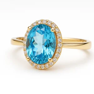Auksinis žiedas su ovalo formos topazu ir deimantais halo dizainas