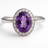 Sužadėtuvių žiedas halo dizaino su ovalo formos ametistu centre ir smulkiais deimantais aplinku